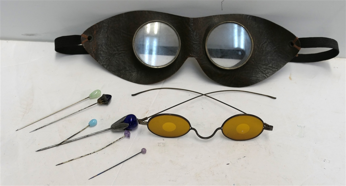 Stick Pins, Driving Goggles, and Unusual Spectacles with Amber Lenses 