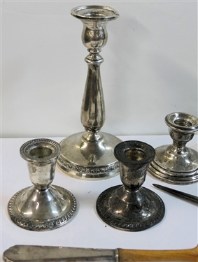 10 Sterling Silver Pieces including 5 Weighted Candle Sticks, Weighted Creamer, Sterling Handled Salad Set and Sterling Handled Carving Set - Tallest Candle Stick Measures 7 Tall 