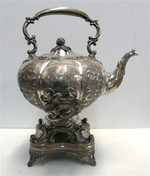 Antique Silverplate Tea Kettle on Stand - Heavily Decorated with Flowers Overall - Stand Arms Are Slightly Bent - Tea Pot Measures 8" To Spout - 13" Spout to Handle