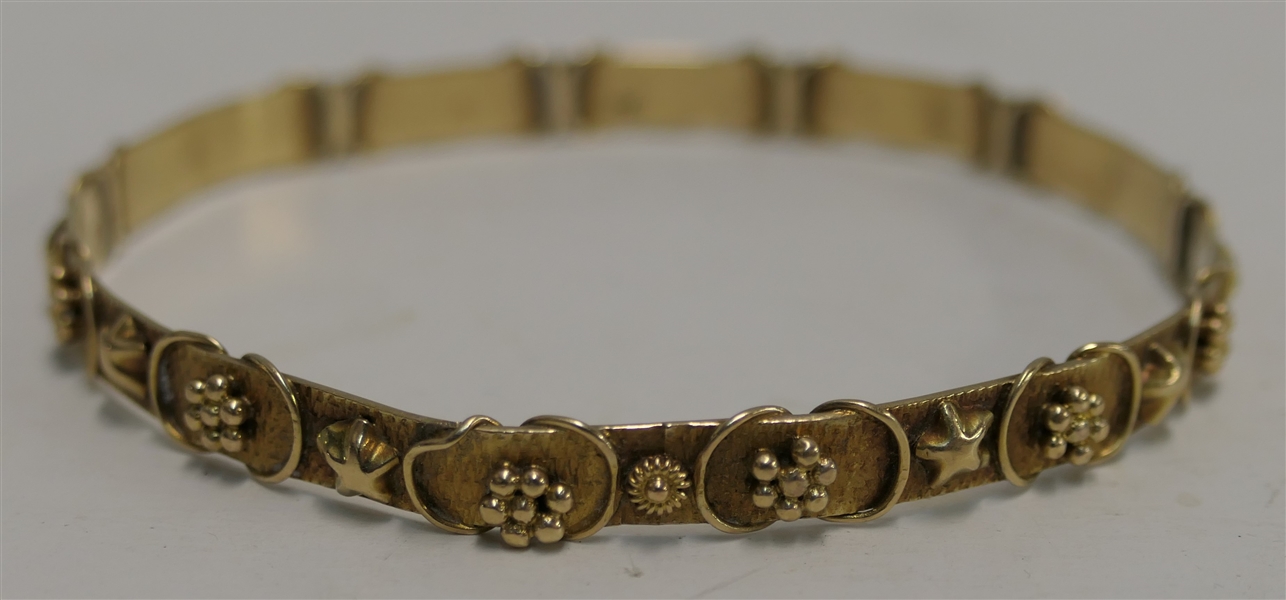 14kt Yellow Gold Bangle Bracelet with Stars and Flowers - Bracelet Weighs 12.7 Grams