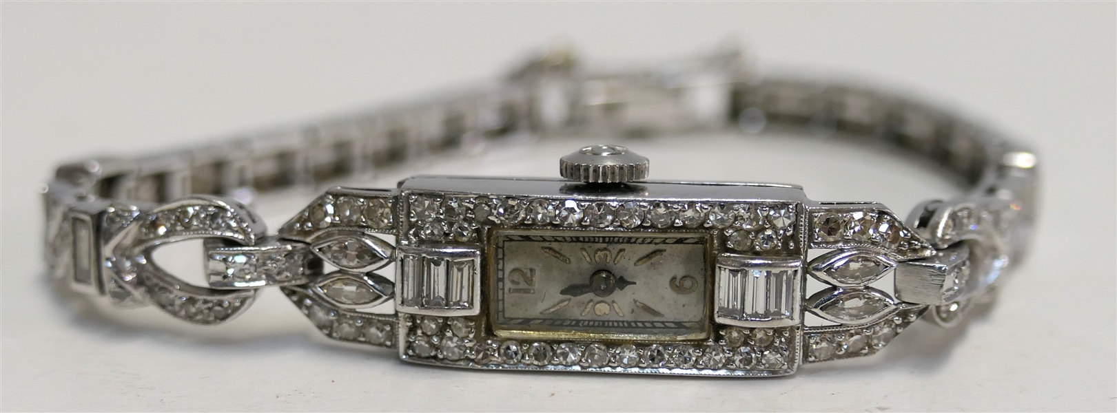 Exceptional Platinum and Diamond Ladies Hamilton Wristwatch - Platinum Encrusted with Diamonds on Bezel, Band, and Clasp - Baguette and Round Diamonds 