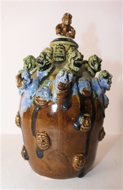 Very Cool Stacy Lambert Seagrove North Carolina Art Pottery Jug with Many Faces - Pottery Stopper - Artist Signed and Dated 11-22-2002 Jug Measures 7 Tall