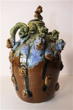 Very Cool Stacy Lambert Seagrove North Carolina Art Pottery Jug with Many Faces - Pottery Stopper - Artist Signed and Dated 11-22-2002 Jug Measures 7 Tall