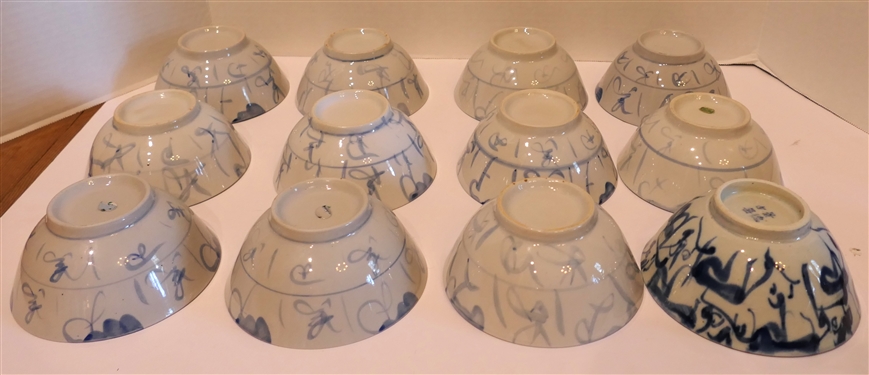 12 - Chinese Blue and White Porcelain Bowls - 11 With Light Blue Decoration - Some with Original Stickers - 1 With Dark Blue Decoration - Chinese Characters on Bottom -Bowls Measure 2 1/2 tall 5...