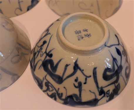 12 - Chinese Blue and White Porcelain Bowls - 11 With Light Blue Decoration - Some with Original Stickers - 1 With Dark Blue Decoration - Chinese Characters on Bottom -Bowls Measure 2 1/2 tall 5...