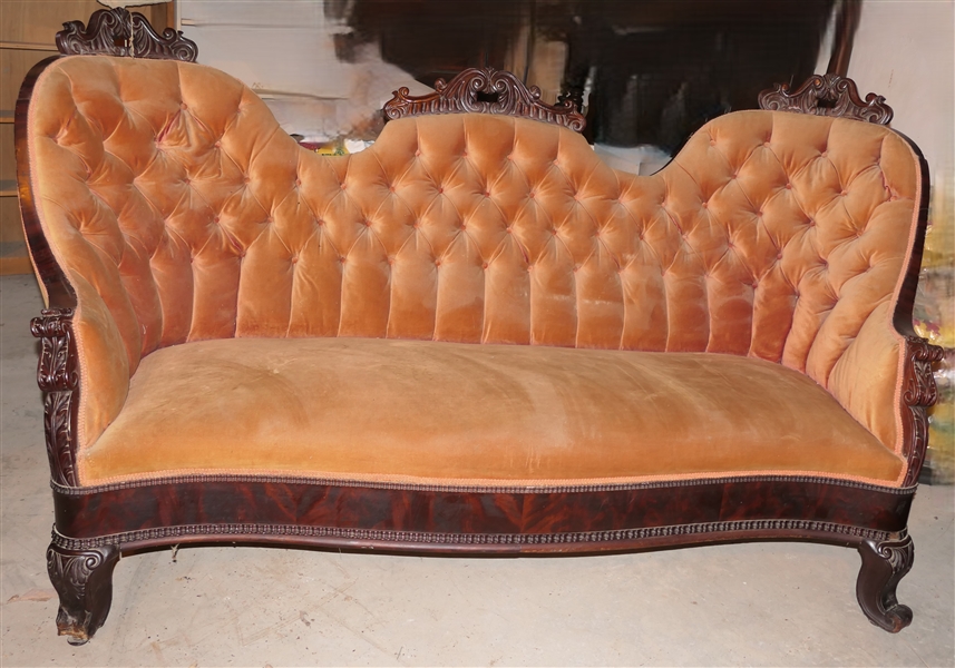 Fine Victorian Sofa with Carved Crests - Serpentine Front - Carved Arms and Fee - Button Tufted Back - Sofa Measures 76" Long - Back Foot Needs Repair - Pieces Are With Sofa