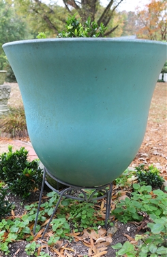 Pretty Turquoise Colored Plastic Planter on Metal Stand - Planter Measures 22 tall 22 Across