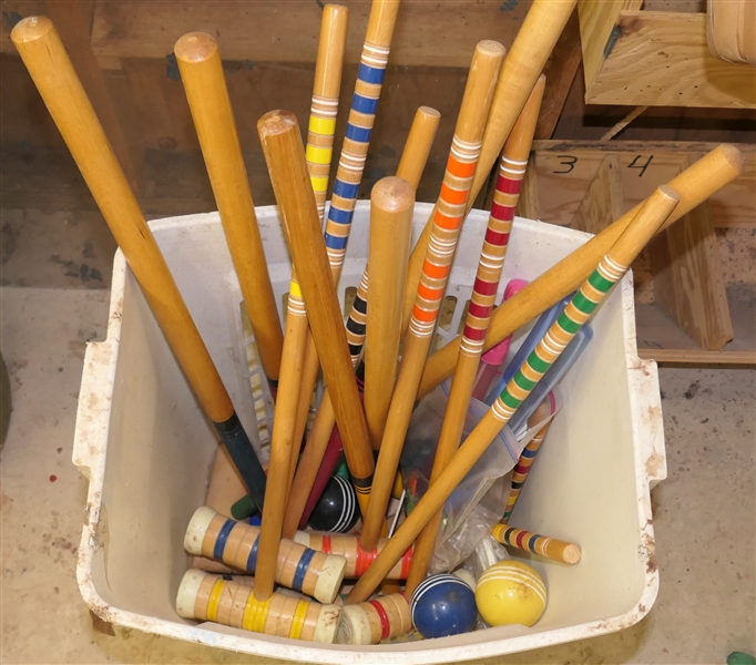 Laundry Basket of Croquet Mallets and Balls 