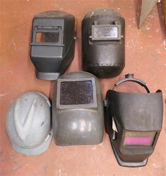 4 Welding Helmets and 1 Hard Hat