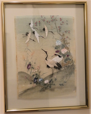 Incredible Asian Silk - Hand Stitched and Hand Painted - Intricately Stitched Crane Birds - Silk is Suspended Between 2 Glass Panels and Framed - Frame Measures 35 1/2" by 27 1/2" 