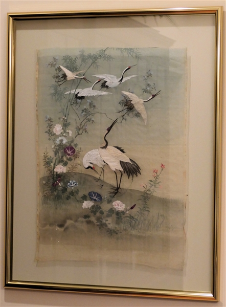 Incredible Asian Silk - Hand Stitched and Hand Painted - Intricately Stitched Crane Birds - Silk is Suspended Between 2 Glass Panels and Framed - Frame Measures 35 1/2" by 27 1/2" 