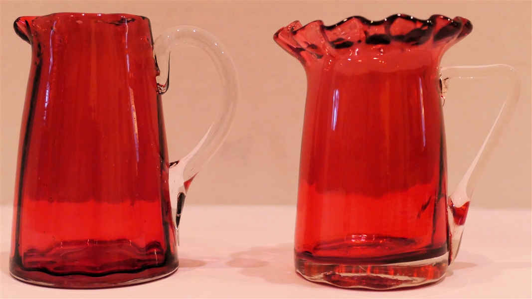 2 Hand Blown Pilgrim Glass Pitchers - Cranberry with Clear Applied Handles - Pitcher with Fluted Top is 3 1/2" Tall 