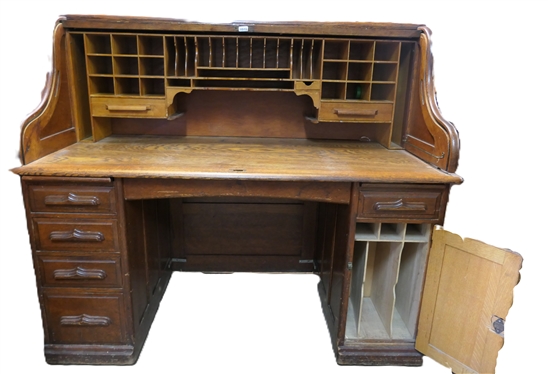 Very Nice Solid Oak S Roll Top Dest - Top with Many Divided Sections and Drawers - Bottom Desk Base with Dovetailed Drawers and Divided Cabinet -Small Hidden Door on Right Side -  Desk Measures...