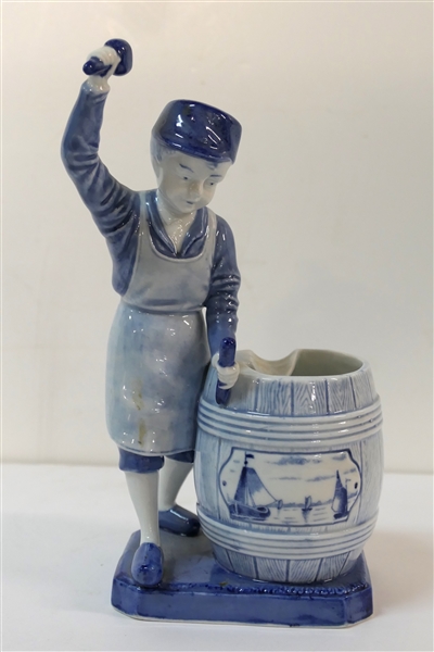 Blue Delft Figural Ash Tray -  Boy with Barrel - Blue and White Sailing Ships on Barrel - Boy Measures 8" Tall - Base Measures  4" by 3" - 