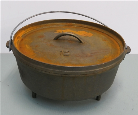 Lodge Camp Dutch Oven - Number 12 - Footed Cast Iron Dutch Oven with Lid and Instruction Pamphlet