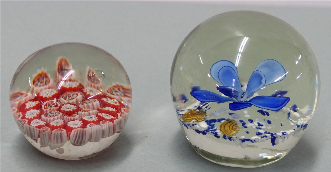 2 Art Glass Paperweights - Smaller Red and White Millefiori and Larger with Blue Flower and Blue and White Flecks - Millefiori Measures 2" Tall 2" across