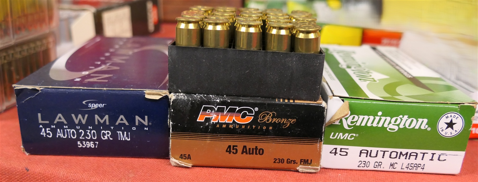 3 Boxes of 45 Automatic Ammunition  - Full Box Remington UMC 45 Automatic 230 Gr., Full Box of Speer Lawman 45 Auto 230 Gr. TMJ, and Half Box PMC Bronze 45 Auto - 230 Gr FMJ - 125 Rounds Total 