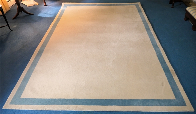 Off White Bound Carpet Rug with Light Blue Border - Measures 9 by 6
