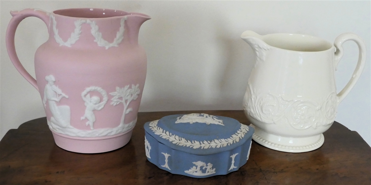 3 Pieces of Wedgwood - Wedgwood Patrician Cream Pitcher (#30) 5" Tall , Pink Unsigned Jasperware Pitcher 23/207, and Blue Jasperware Lidded Box - 1 1/2" Tall 4 1/2" by 3" 