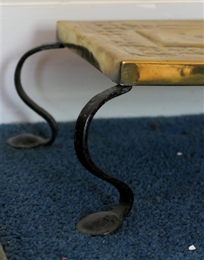 Arts and Crafts Period Brass and Iron Foot Stool - Embossed Flower Design on Brass Top - Curved Iron Legs with Round Feet - Stool Measures 5 Tall 22 by 9 