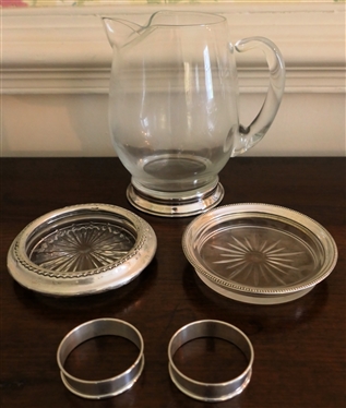 2 Coasters with Sterling Silver Rims, Clear Glass Pitcher with Sterling Silver Base, and 2 Gorham Sterling Napkin Rings 