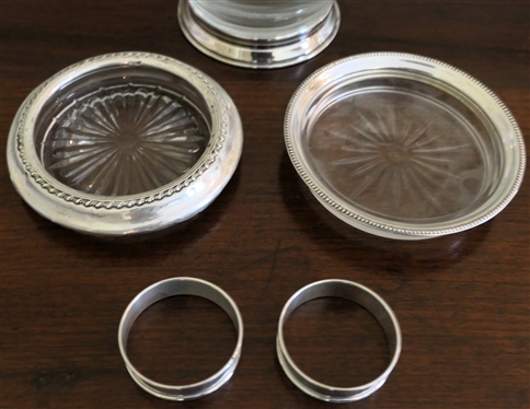 2 Coasters with Sterling Silver Rims, Clear Glass Pitcher with Sterling Silver Base, and 2 Gorham Sterling Napkin Rings 