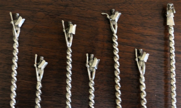 12 Hand Crafted Silver Cocktail Stirrer Spoons with Tiny Handmade Man and Woman Terminals - Twisted Stems - Each Spoon Measures 7 1/8 Long 