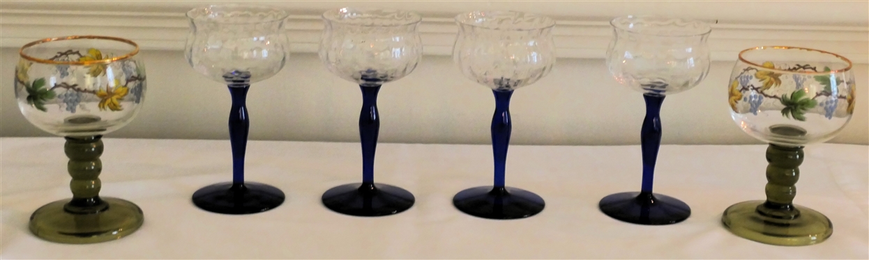 6 Coupe Glasses - 4 with Cobalt Blue Stems and 2 with Olive Green Stems- Grape and Leaf Motif - Cobalt Blue Measure 4 3/4 Tall 
