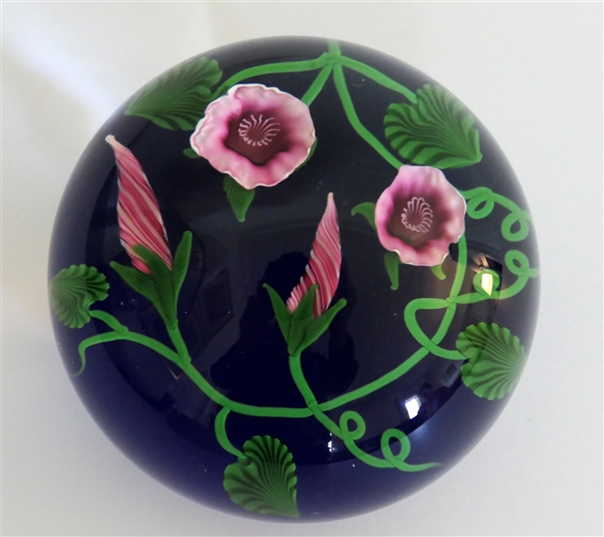 Steven Lundberg - Lundberg Studios - 1991 Artist Signed Art Glass Paperweight with Pink and White Flowers and Green Vines - Paperweight Measures 2 1/2" Tall 3" Across