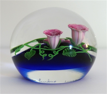 Steven Lundberg - Lundberg Studios - 1991 Artist Signed Art Glass Paperweight with Pink and White Flowers and Green Vines - Paperweight Measures 2 1/2 Tall 3 Across