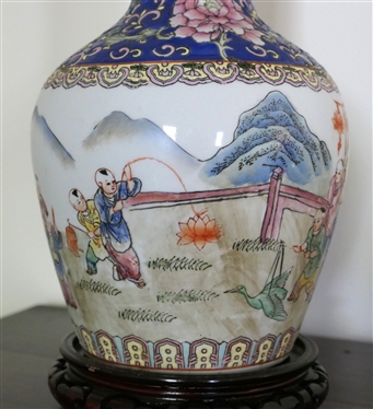 Pretty Oriental Decorator Vase Style Table Lamp with Lots of Figures and Mountains - Blue Neck with Orange Flowers- Wood Base - Lamp Measures 18 to Bulb