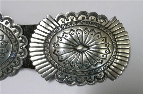 Vintage Navajo Concho Belt - Buckle Marked S. James - Sterling - All Conchos and Buckle are Hand Stamped - Buckle Measures 3 by 2 1/4 - 9 Hand Stamped Conchos - Each Measure 2 3/4 by 2 1/8 -...