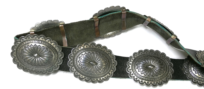 Vintage Navajo Concho Belt - Buckle Marked S. James - Sterling - All Conchos and Buckle are Hand Stamped - Buckle Measures 3 by 2 1/4 - 9 Hand Stamped Conchos - Each Measure 2 3/4 by 2 1/8 -...
