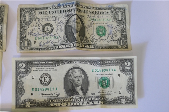Coin and Currency Lot including - 1935 D Blue Seal Dollar, 1935 E Blue Seal Dollar, 2 - 1976 Bicentennial $2 Bills, 2 Bank of England 1 Pound Notes, 1967 Quarter, 21 Wheat Pennies, 2  Dimes, and...