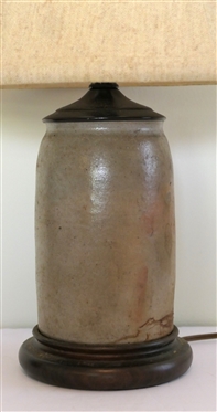 Virginia Gray Stoneware Storage Jar Converted Into Table Lamp - Wood Base - Jar Has Been Drilled for Lamp Cord - Lamp Has Brass Bird Finial - Measures 12 To Bulb 