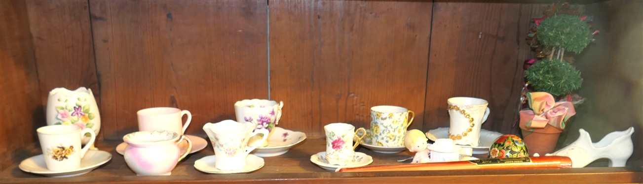 Shelf Lot including Wedgwood Cup and Saucer Sets, Floral Cup and Saucers, Moustache Cup, Creamer, Black Lacquer Paperweight, Etc. 