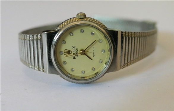 Rolex of Geneva Swiss Made Quartz Rolex Ladies Wrist Watch - Swiss Quartz Number 17  85030051 97 - Stainless Steel Rolex Band - Diamond Number Markers on Dial - Measures 1 Across Dial 