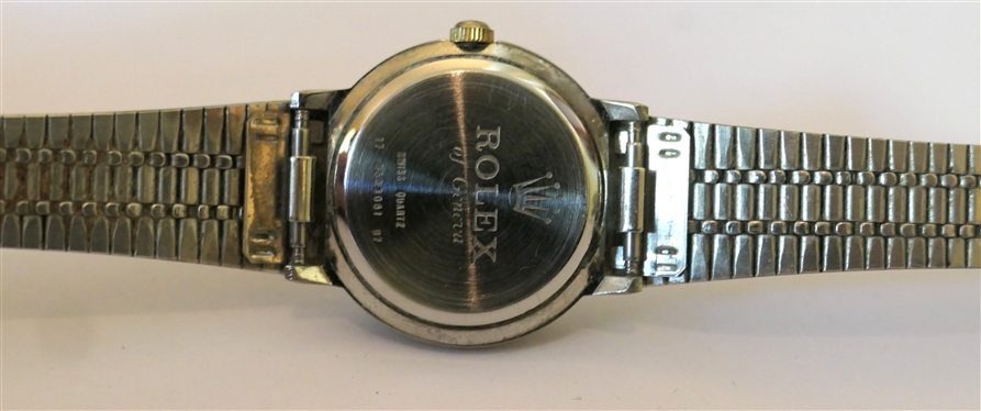 Rolex of Geneva Swiss Made Quartz Rolex Ladies Wrist Watch - Swiss Quartz Number 17  85030051 97 - Stainless Steel Rolex Band - Diamond Number Markers on Dial - Measures 1 Across Dial 