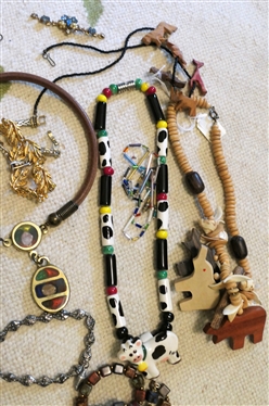 Large Lot of Costume Jewelry including Copper Bracelets, Wood Necklaces, Beaded Necklaces, Handmade Beads, Rhinestones, Brooches, Earrings, Pins, Cows, Animals, 