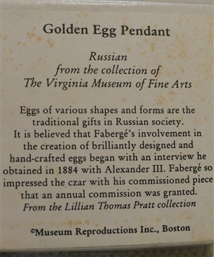Collection of Museum Jewelry including Monet Hat Pin, Springerle Cookie Form, Megalodon Tooth Fossil Necklace, Greek Horse Brooch, Golden Egg Pendant, and The Met Chinese Dragon Brooch 