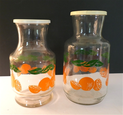 2 Orange Juice Bottles with Plastic Lids - Larger is 9 1/2 tall 