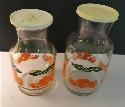 2 Orange Juice Bottles with Plastic Lids - Larger is 9 1/2 tall 
