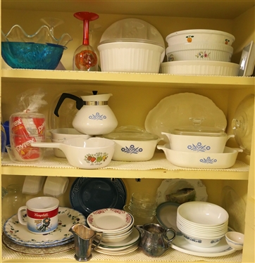 Kitchen Cabinet Lot including Corningware Casserole Dishes, Cornflower Blue, Corelle Bowls, Misc Plates, Mugs, and Silverplate Items