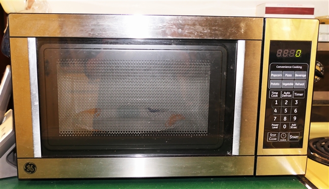 Small GE Stainless Steel Microwave 