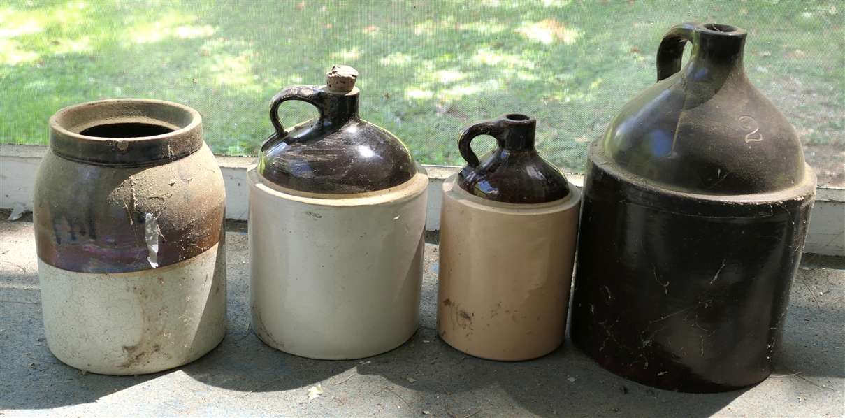 4 Stone Pottery Pieces - Brown and White Crock, 2 Brown and White Jugs, and Brown 2 Gallon Jug - with Some Damage to Top 