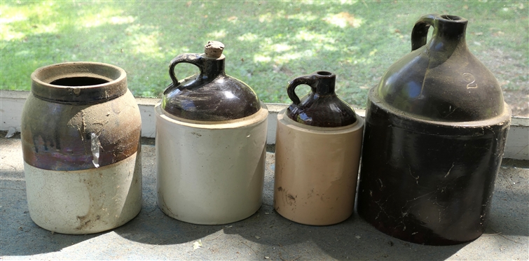 4 Stone Pottery Pieces - Brown and White Crock, 2 Brown and White Jugs, and Brown 2 Gallon Jug - with Some Damage to Top 