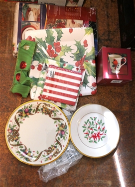 Lot of Christmas Items - Lenox Plates, Christmas Glasses, Kitchen Towels, Table Cloth, Paper goods, Dip Bowl, and Lenox Mug 