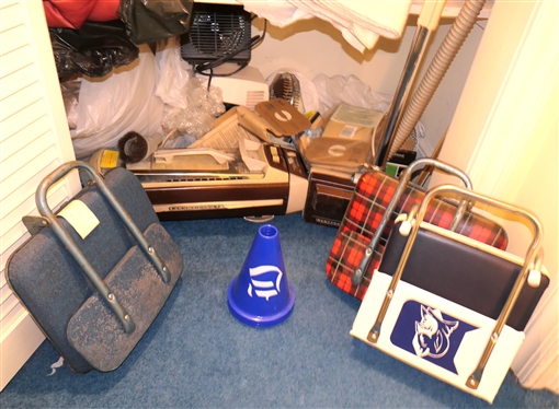 Contents of Bottom of Linen Closet - Electrolux Vacuum Cleaner, Fans, Heater, Humidifier, Vintage Stadium Seats