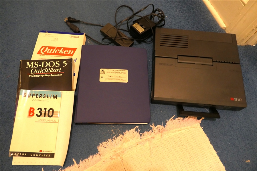 Bondwell B310 Superslim Laptop Computer - with Instruction Manual, Charger, Battery , Manual, and Instructions for Quicken and MS - DOS 5 