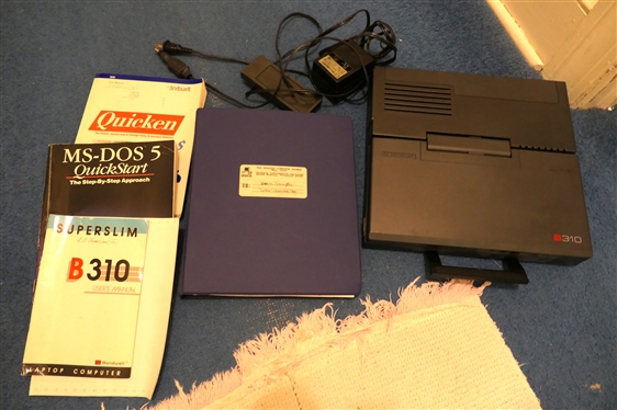 Bondwell B310 Superslim Laptop Computer - with Instruction Manual, Charger, Battery , Manual, and Instructions for Quicken and MS - DOS 5 